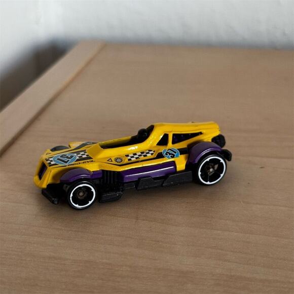 Hot Wheels Med-Evil Yellow Purple Diecast Car Mystery Models 2013 Racing Theme - Picture 1 of 6